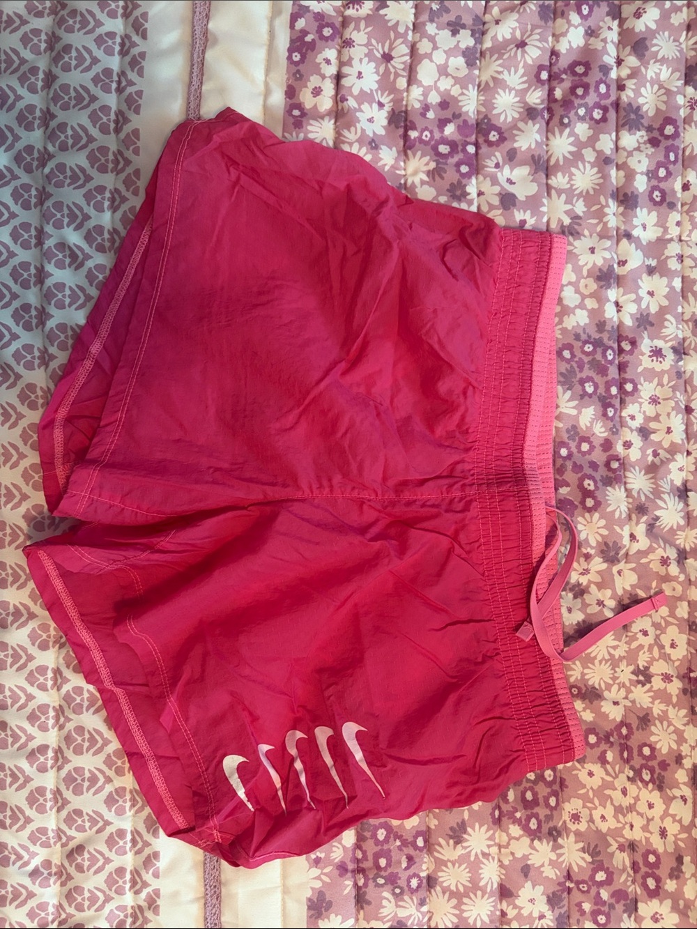 Nike Women's Hot Pink Athletic Running Shorts with White Swoosh